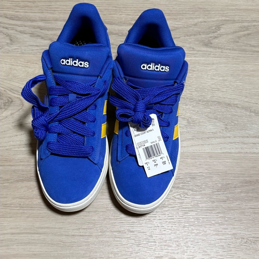 Adidas Blue Sneakers with Yellow Accents